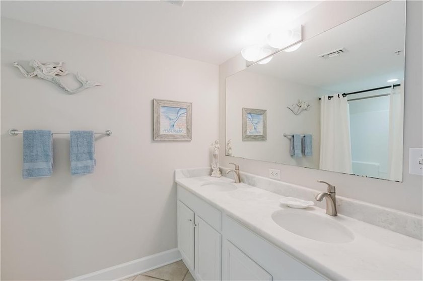Welcome to Sanibel, where coastal luxury and convenience meet in - photo 13