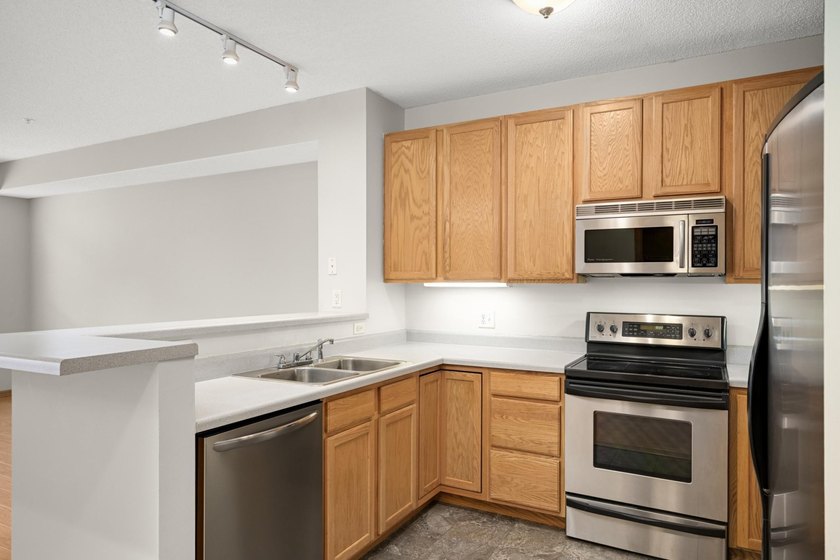 Rarely available corner unit at River Station Condos in the - photo 11