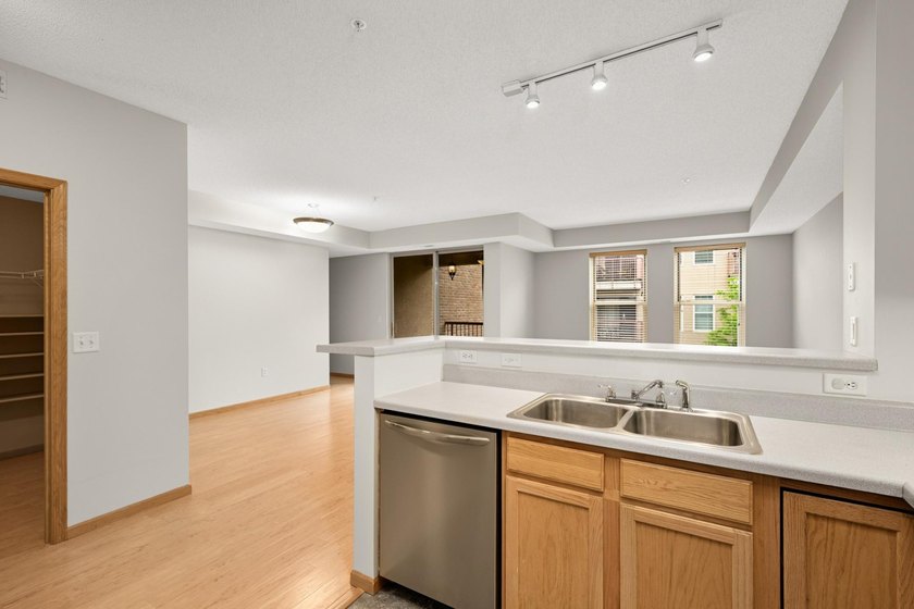 Rarely available corner unit at River Station Condos in the - photo 12