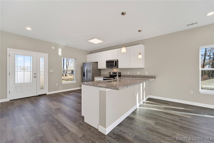 Welcome to your brand-new, move-in-ready home in Four Seasons - photo 9