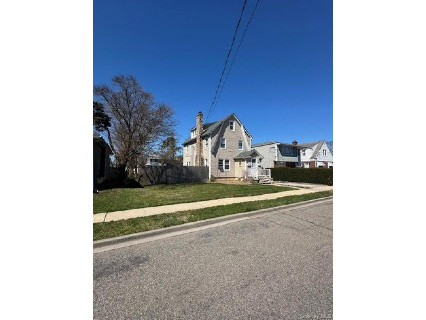 Centrally located two-family home offering a strong opportunity - photo 2
