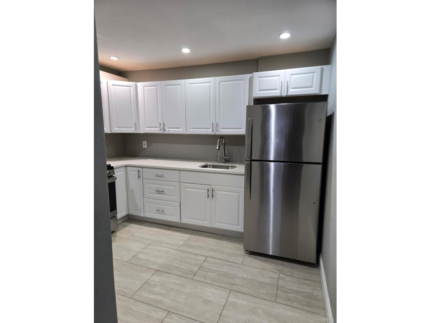 Centrally located two-family home offering a strong opportunity - photo 6
