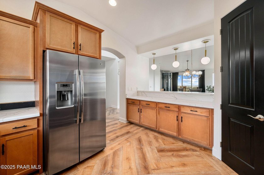 Luxury meets low-maintenance living in this exquisitely updated - photo 7