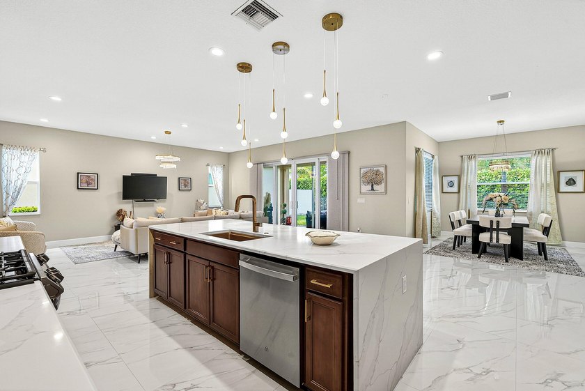 This beautifully updated 5-bedroom, 4-bath home offers the - photo 13