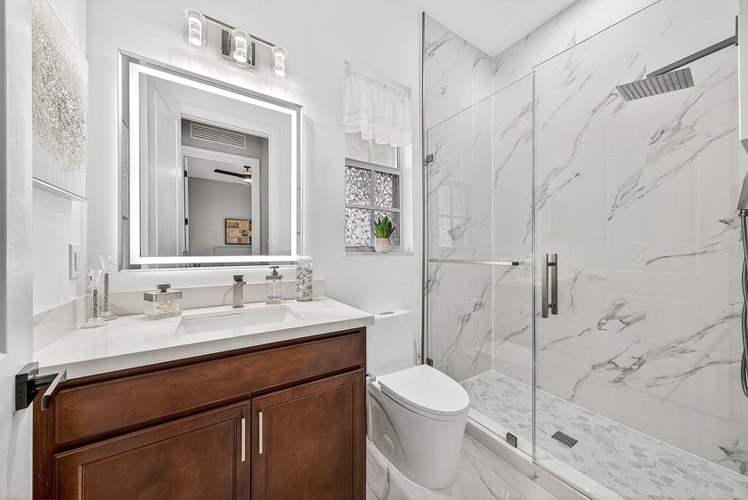 This beautifully updated 5-bedroom, 4-bath home offers the - photo 19