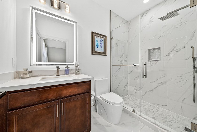This beautifully updated 5-bedroom, 4-bath home offers the - photo 28