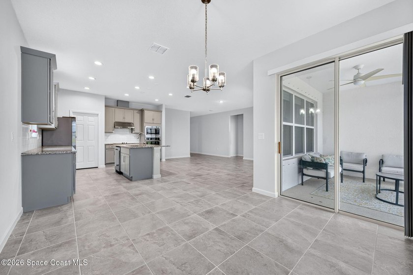 Welcome to this stunning lakefront split plan home in The - photo 6