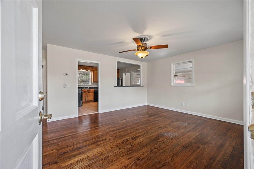 Welcome home to this well-cared-for brick beauty in the heart of - photo 6