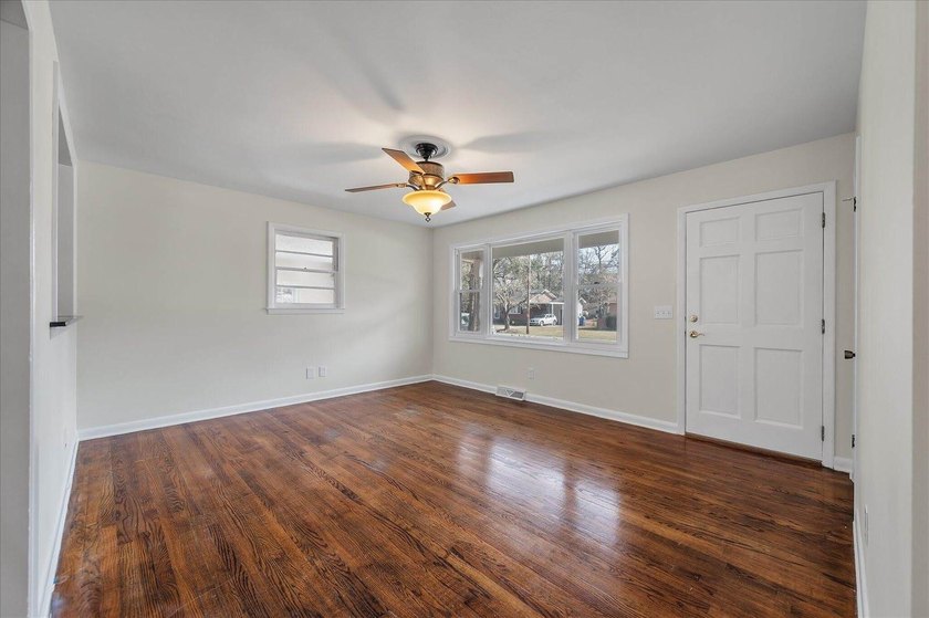 Welcome home to this well-cared-for brick beauty in the heart of - photo 7