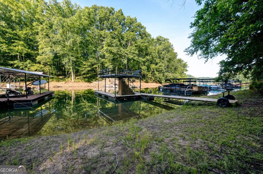 If you've been searching for a Lake Lanier lakefront home with a - photo 3