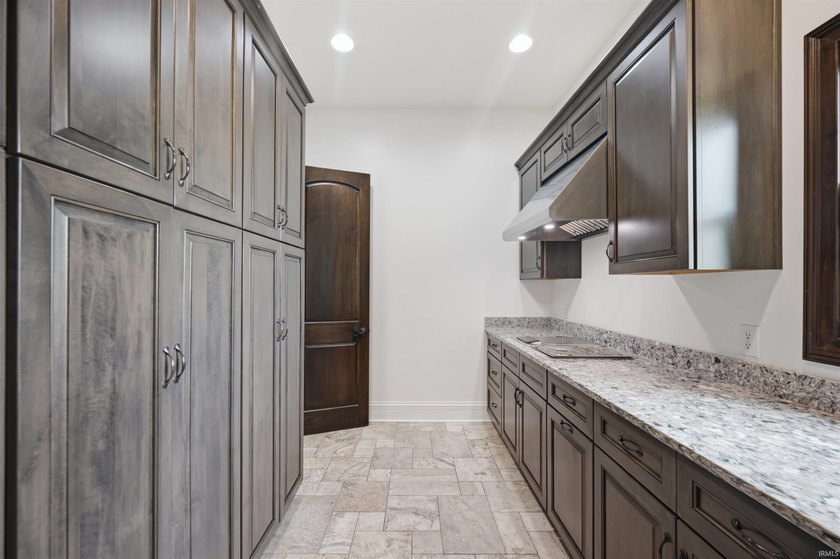 This exceptional Boone County property features a custom-built - photo 16
