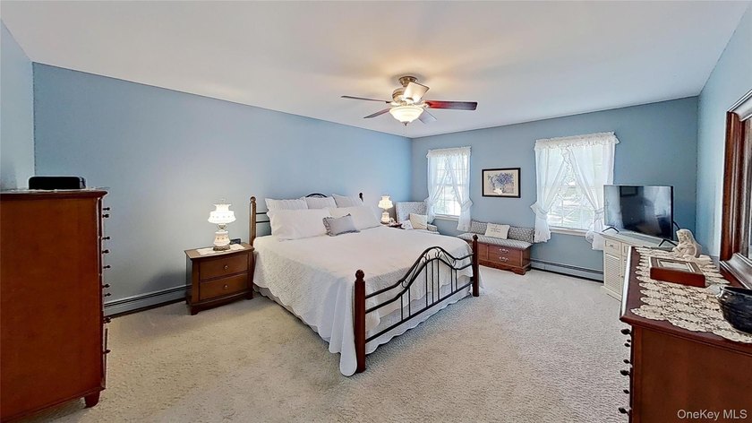 This stately residence is situated on a private street, north of - photo 16