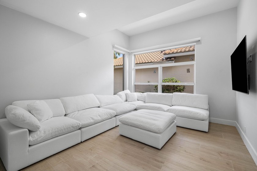 Completely renovated, this beautifully reimagined residence - photo 17