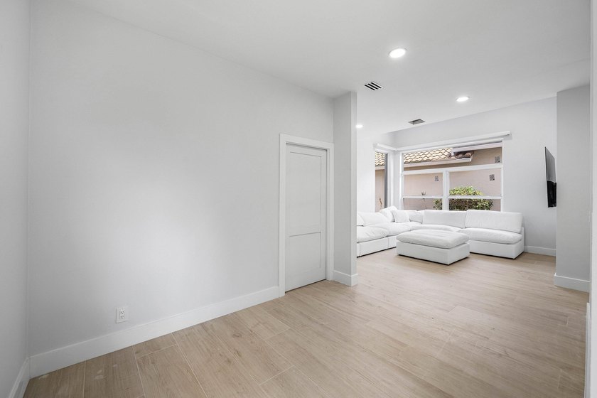 Completely renovated, this beautifully reimagined residence - photo 18