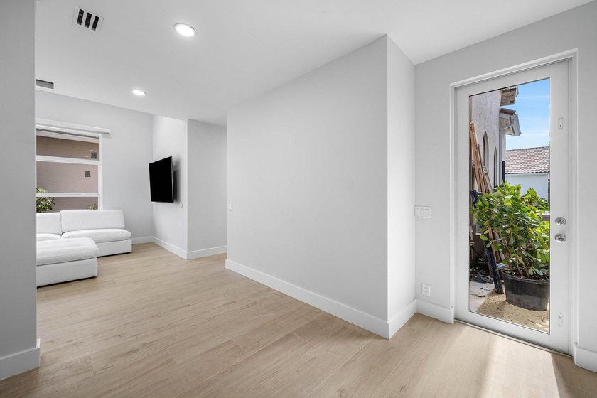 Completely renovated, this beautifully reimagined residence - photo 19