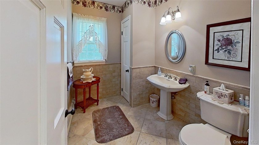 This stately residence is situated on a private street, north of - photo 20