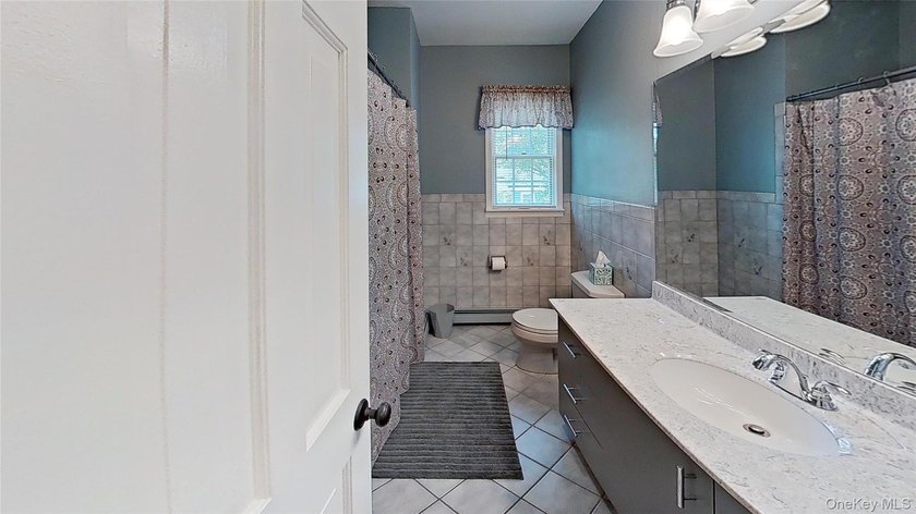 This stately residence is situated on a private street, north of - photo 21