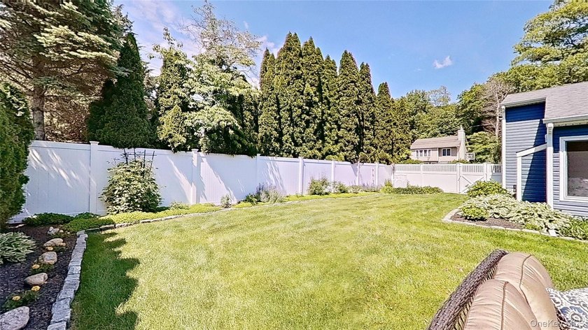 This stately residence is situated on a private street, north of - photo 26