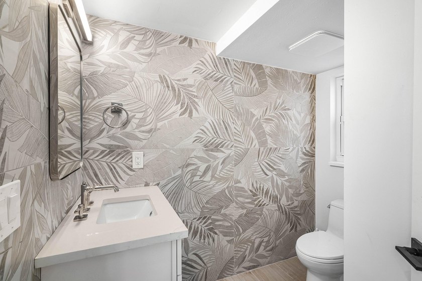 Completely renovated, this beautifully reimagined residence - photo 32