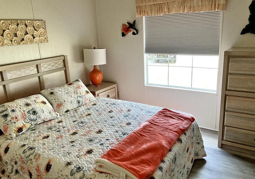 This home features New Dishwasher, Flooring, Newer Roof, A/C - photo 11