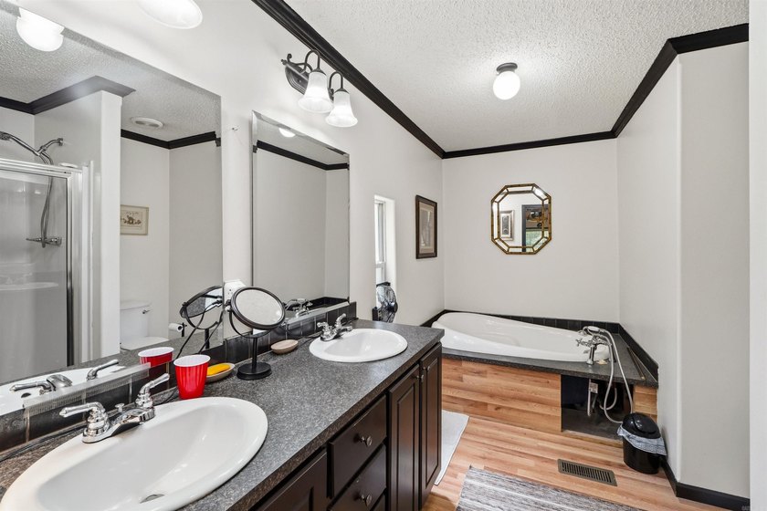 Discover the perfect blend of comfort, space, and lake living! - photo 13