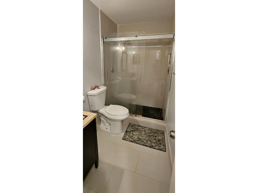 Welcome to this charming two-bedroom, two-bathroom villa in the - photo 15