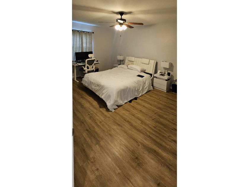 Welcome to this charming two-bedroom, two-bathroom villa in the - photo 18