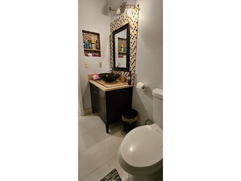Welcome to this charming two-bedroom, two-bathroom villa in the - photo 26