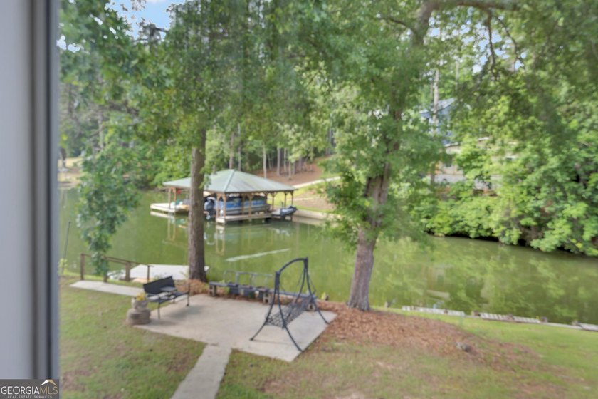 This custom-built full-time lake residence on Jackson Lake is an - photo 3