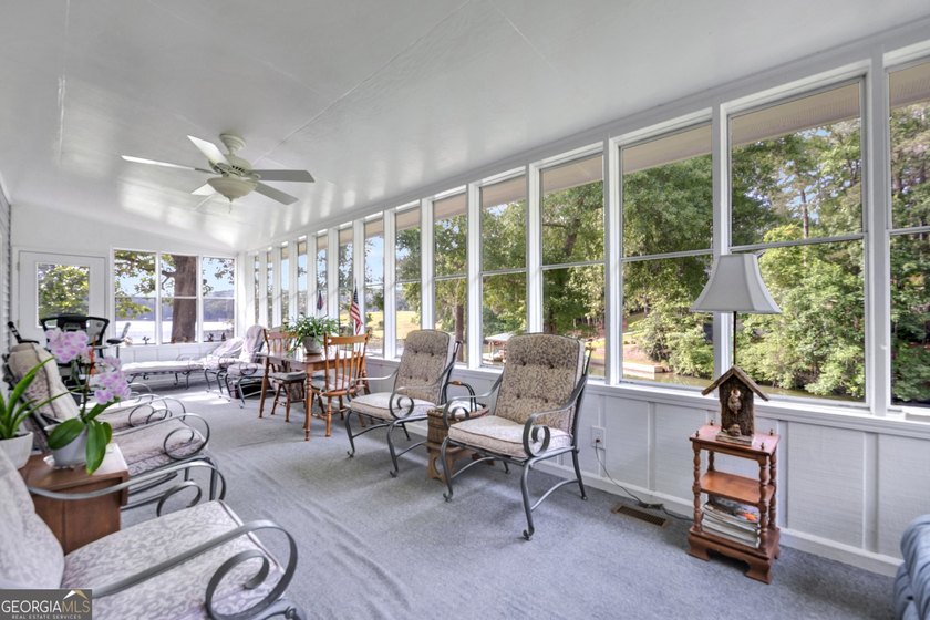 This custom-built full-time lake residence on Jackson Lake is an - photo 10