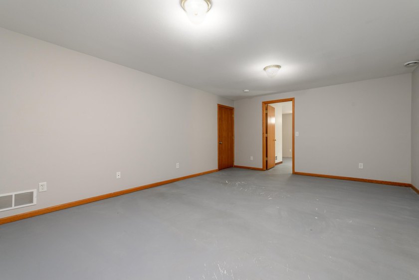 This great split-bedroom Ranch features spacious rooms, an open - photo 12