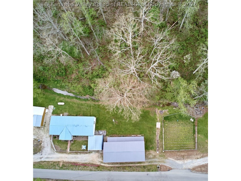Situated on two acres in rural Milton, this 1996 double-wide - photo 2