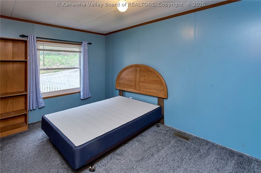Situated on two acres in rural Milton, this 1996 double-wide - photo 7