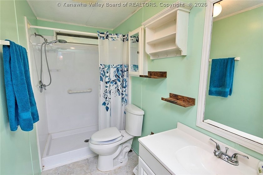 Situated on two acres in rural Milton, this 1996 double-wide - photo 8