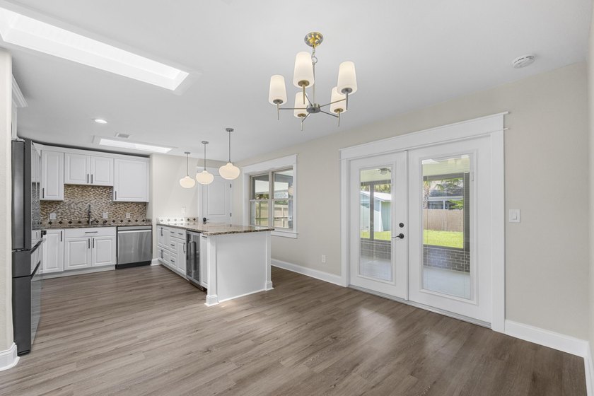 This impeccably renovated home is ready to move in! From the - photo 7