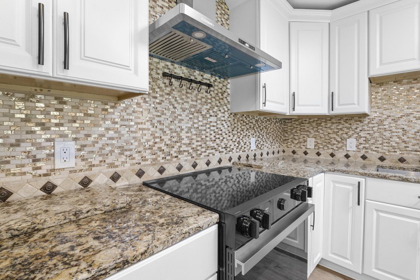 This impeccably renovated home is ready to move in! From the - photo 10