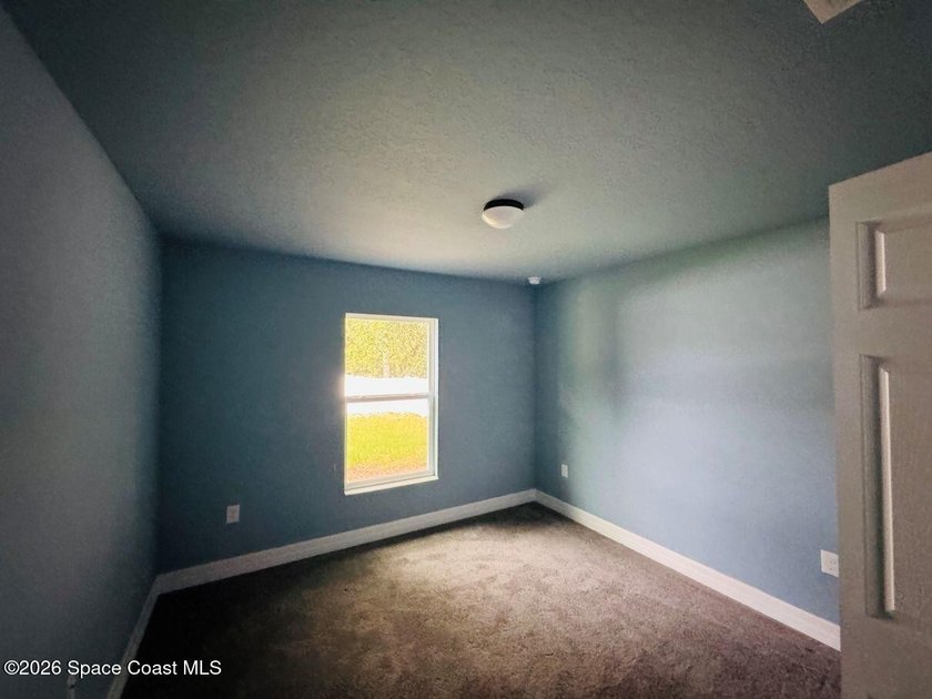 Built in 2022, this 3-bedroom, 2-bathroom home offers 1,516 - photo 3