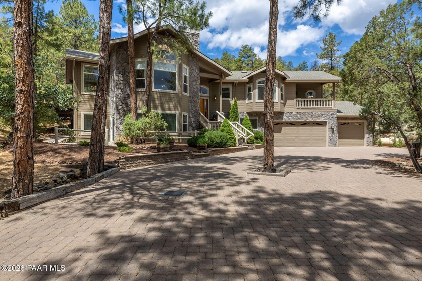 This exceptional property offers privacy and majestic tall pines - photo 3