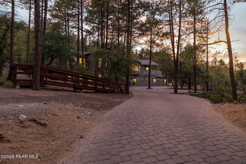This exceptional property offers privacy and majestic tall pines - photo 9