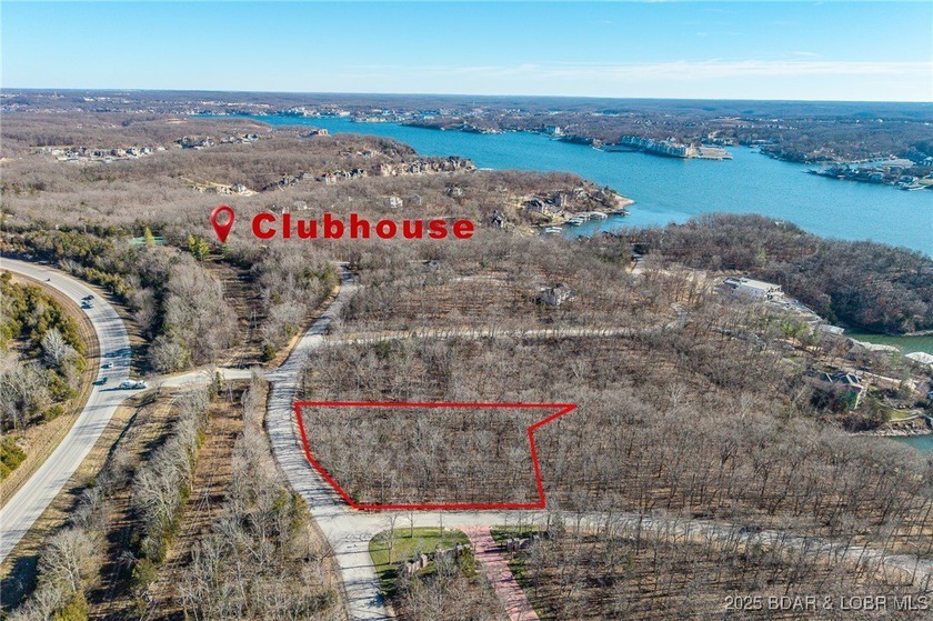 Surrounded by mature trees and natural Ozarks beauty, this - photo 2