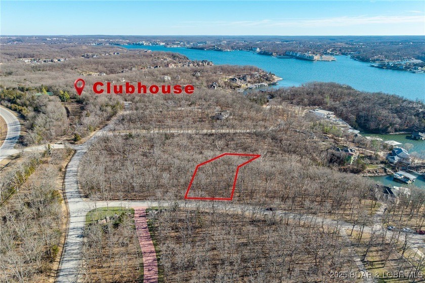 Surrounded by mature trees and natural Ozarks beauty, this - photo 2