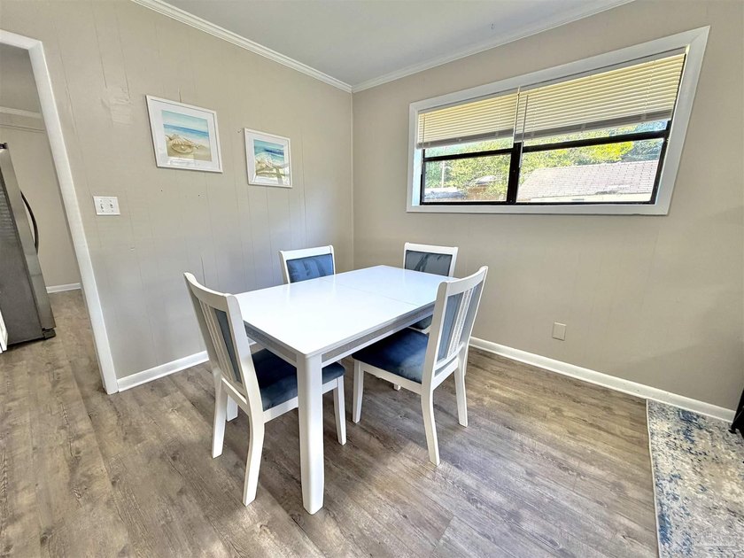 Fully renovated and move-in ready! This charming 3-bedroom - photo 10