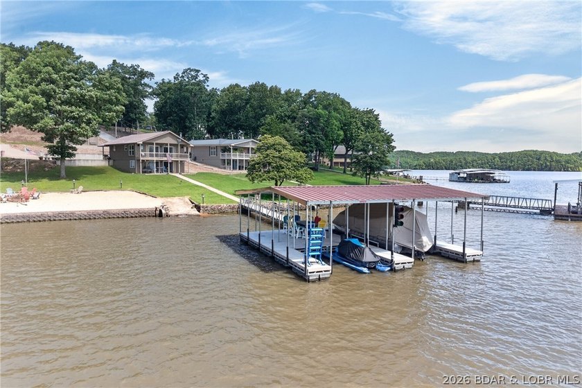 Lakefront living on the desirable 53 Mile Marker! Nestled in the - photo 11