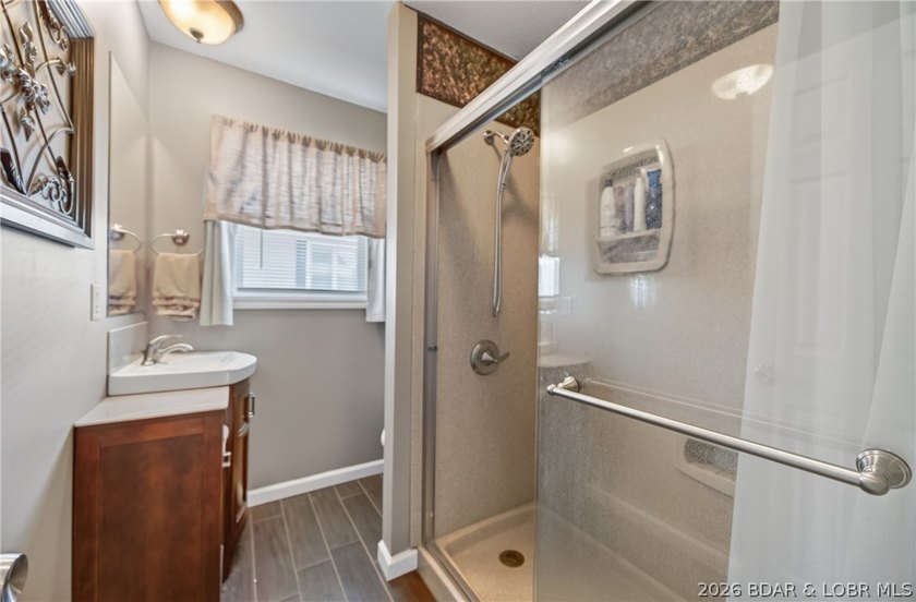 Lakefront living on the desirable 53 Mile Marker! Nestled in the - photo 15