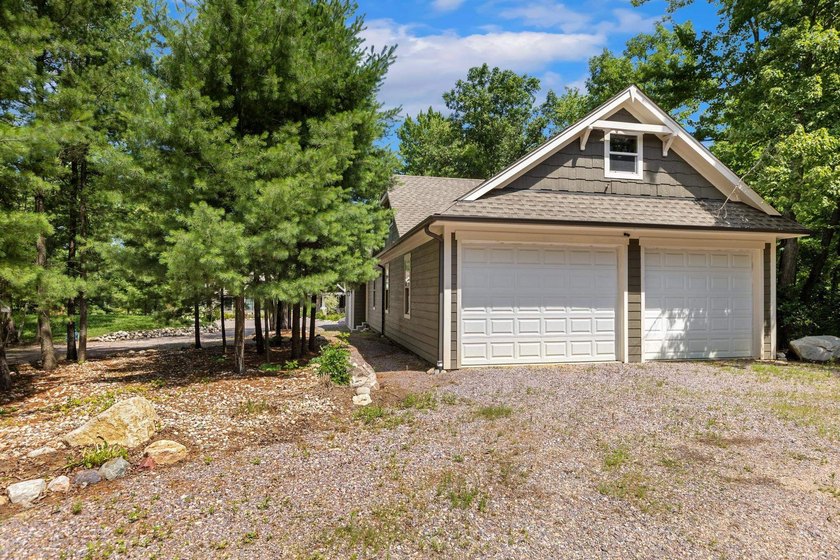 Enjoy peaceful lake living w/ 150' of frontage on private 9-acre - photo 36