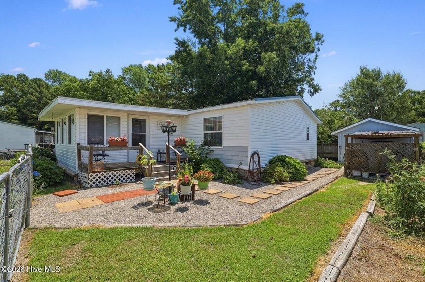Enjoy coastal living and everyday convenience in this - photo 2