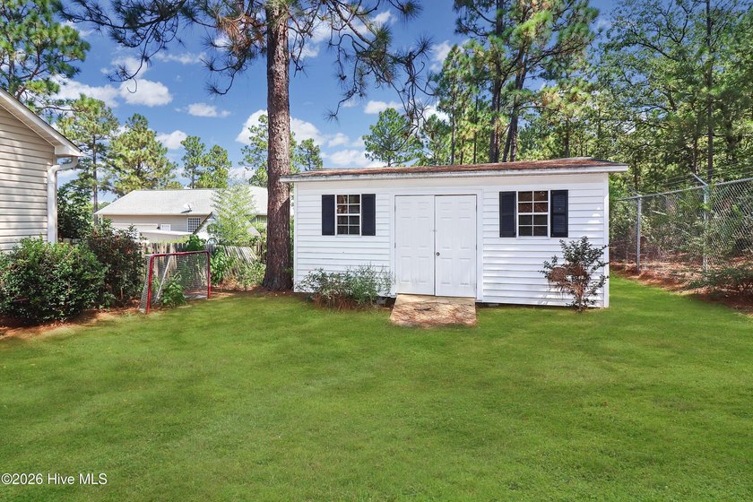 Tucked into the established neighborhood in the Whispering Pines - photo 9