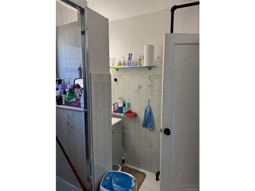 Welcome to a well-maintained two-family home offering - photo 11