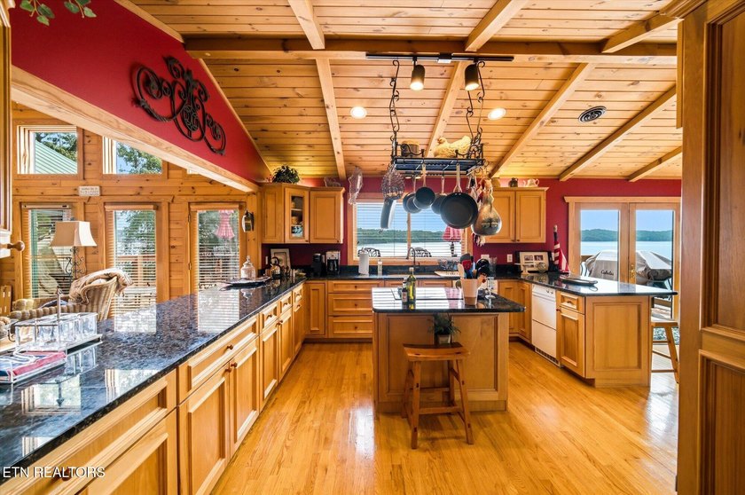 Stunning log home on the main channel of Douglas Lake! This - photo 12
