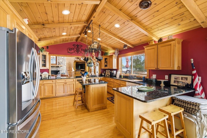 Stunning log home on the main channel of Douglas Lake! This - photo 13